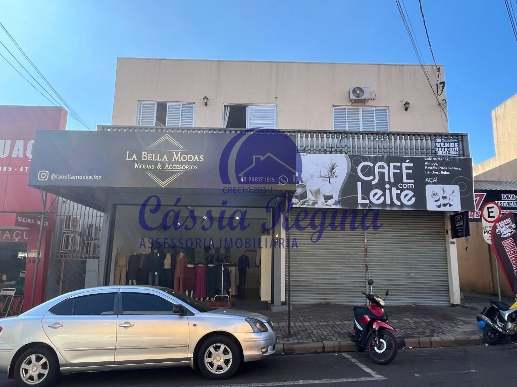 Salas comerciais com apartamento anexo e estacionamento à venda na Vila Portes - 