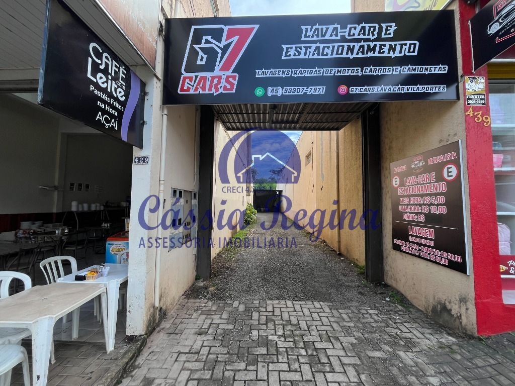 Salas comerciais com apartamento anexo e estacionamento à venda na Vila Portes - 