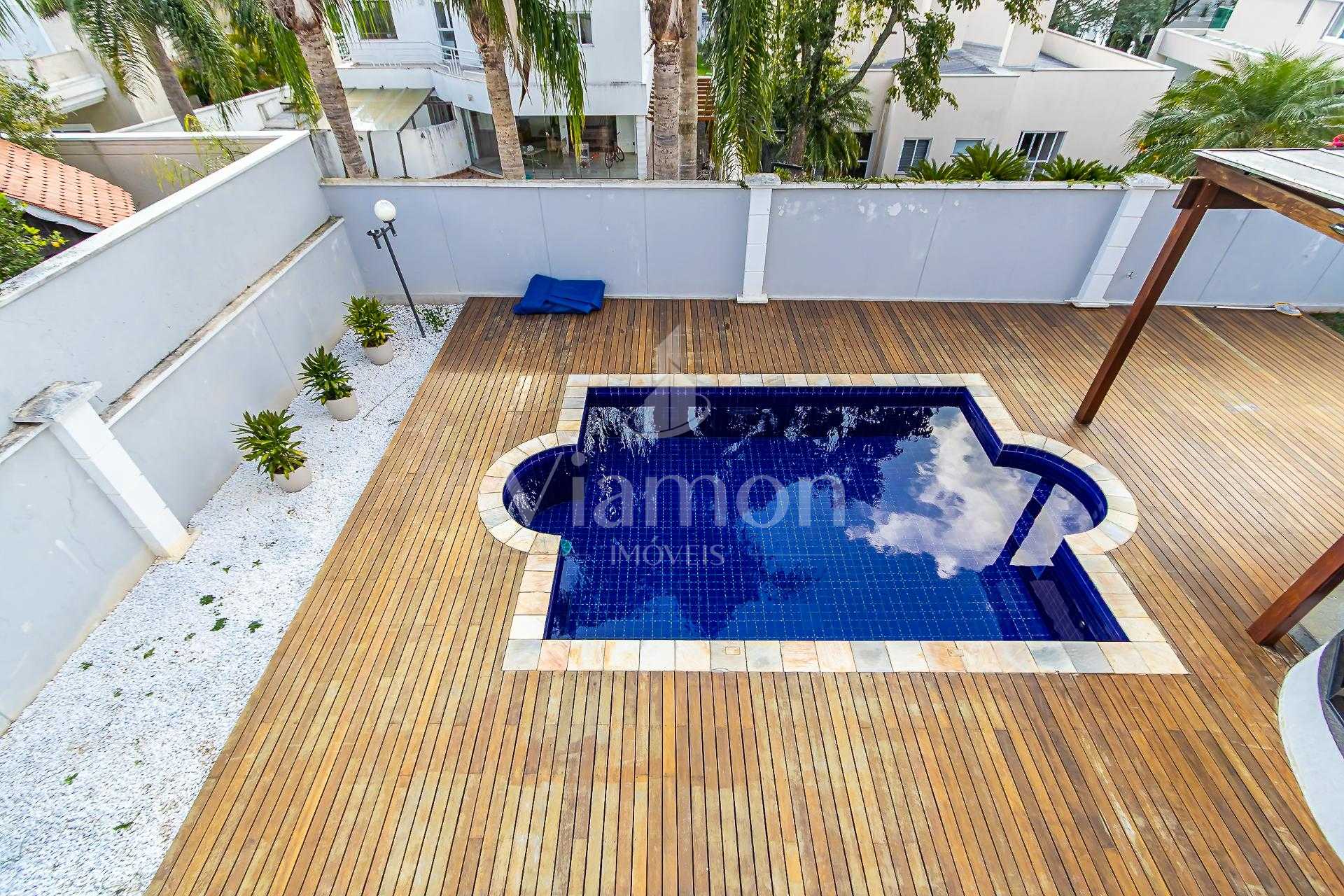 Casa com 4 suítes e piscina à venda, 453m2, Alphaville Gracios...