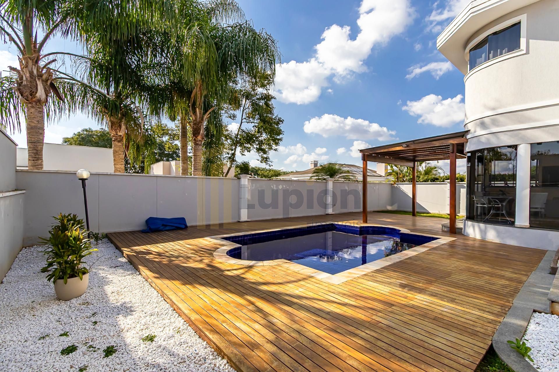 Casa com 4 suítes e piscina à venda, 453m2, Alphaville Gracios...