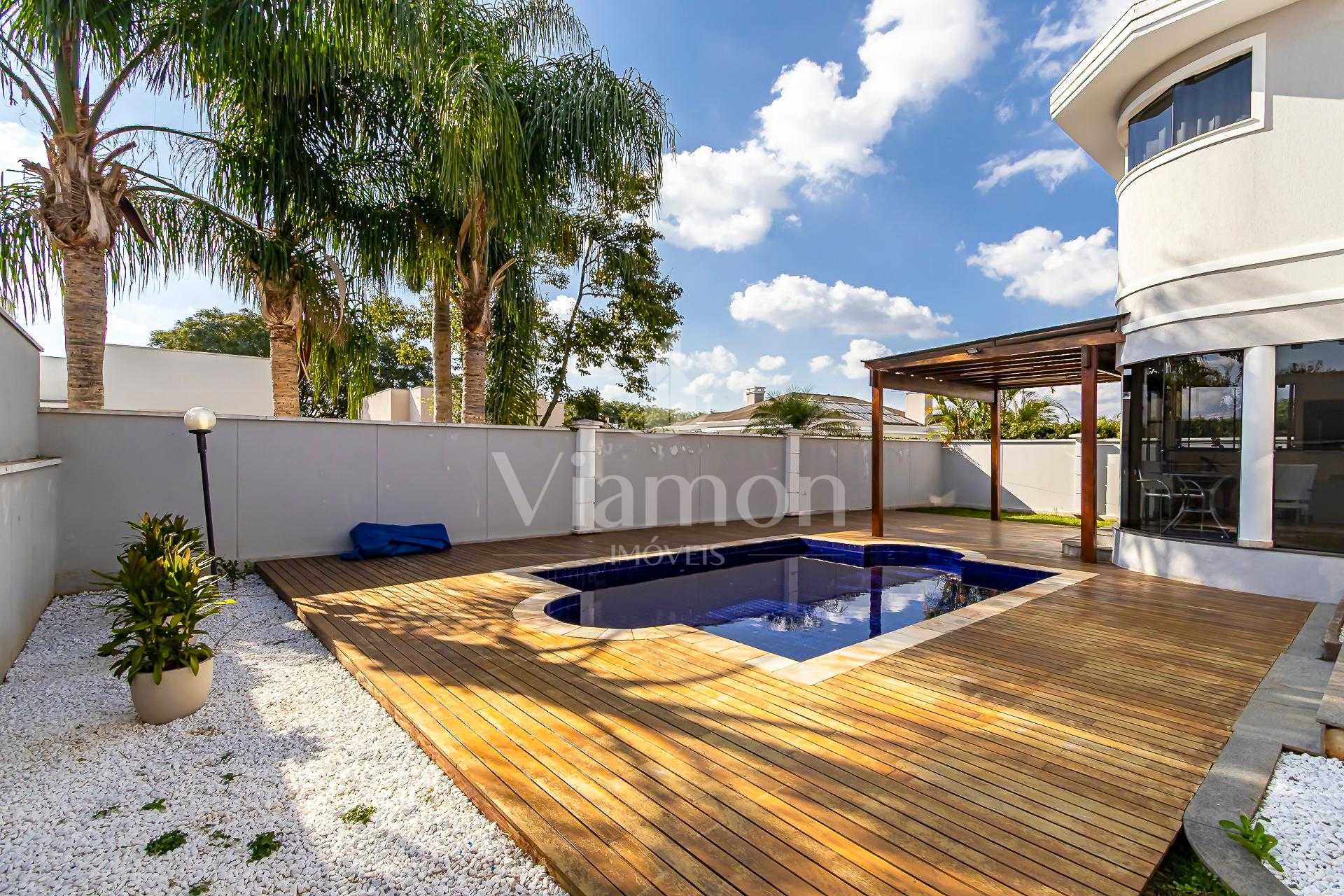 Casa com 4 suítes e piscina à venda, 453m2, Alphaville Gracios...