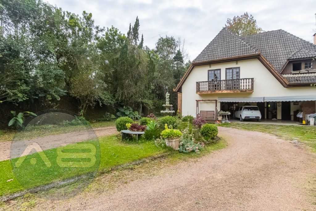 Casa com 4 dormitórios à venda, 680 m² por R$ 2.050.000,00 - T...