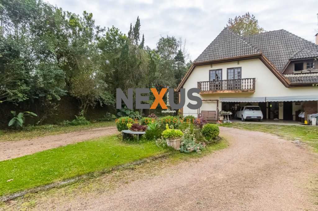 Casa com 4 dormitórios à venda, 680 m² por R$ 2.050.000,00 - T...