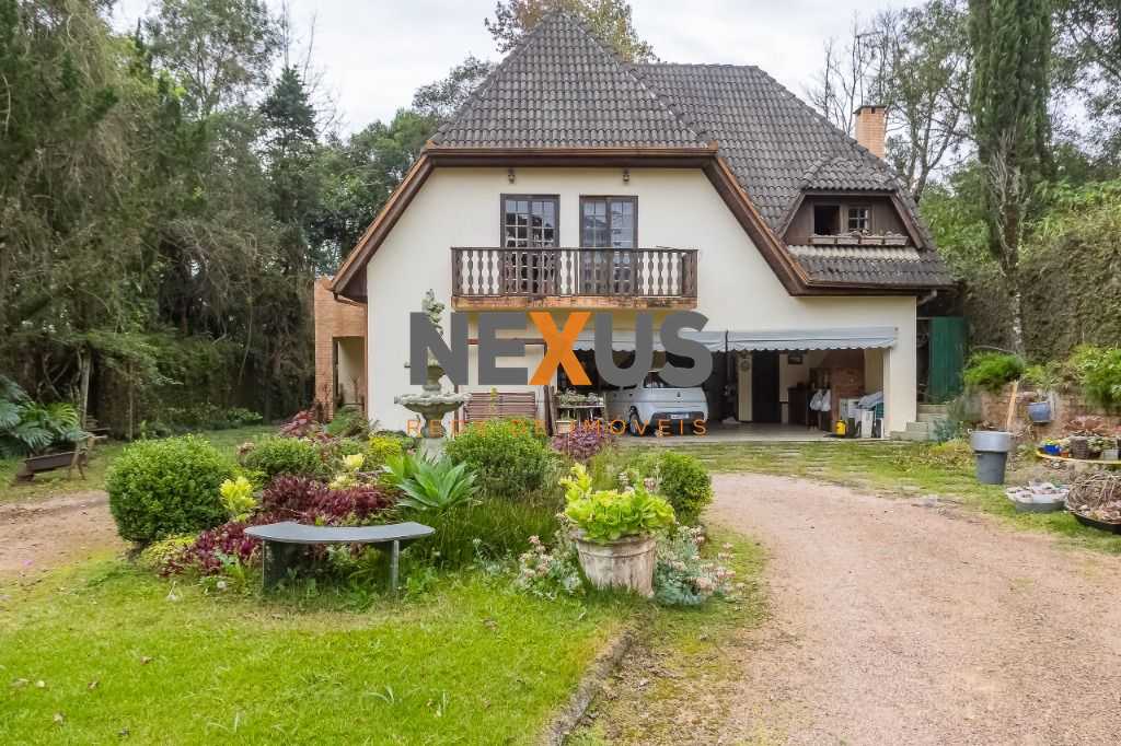 Casa com 4 dormitórios à venda, 680 m² por R$ 2.050.000,00 - T...