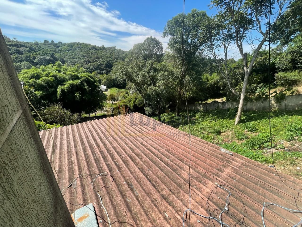 Viva com liberdade e conforto  Terreno com 2 casas em Campo Ma...