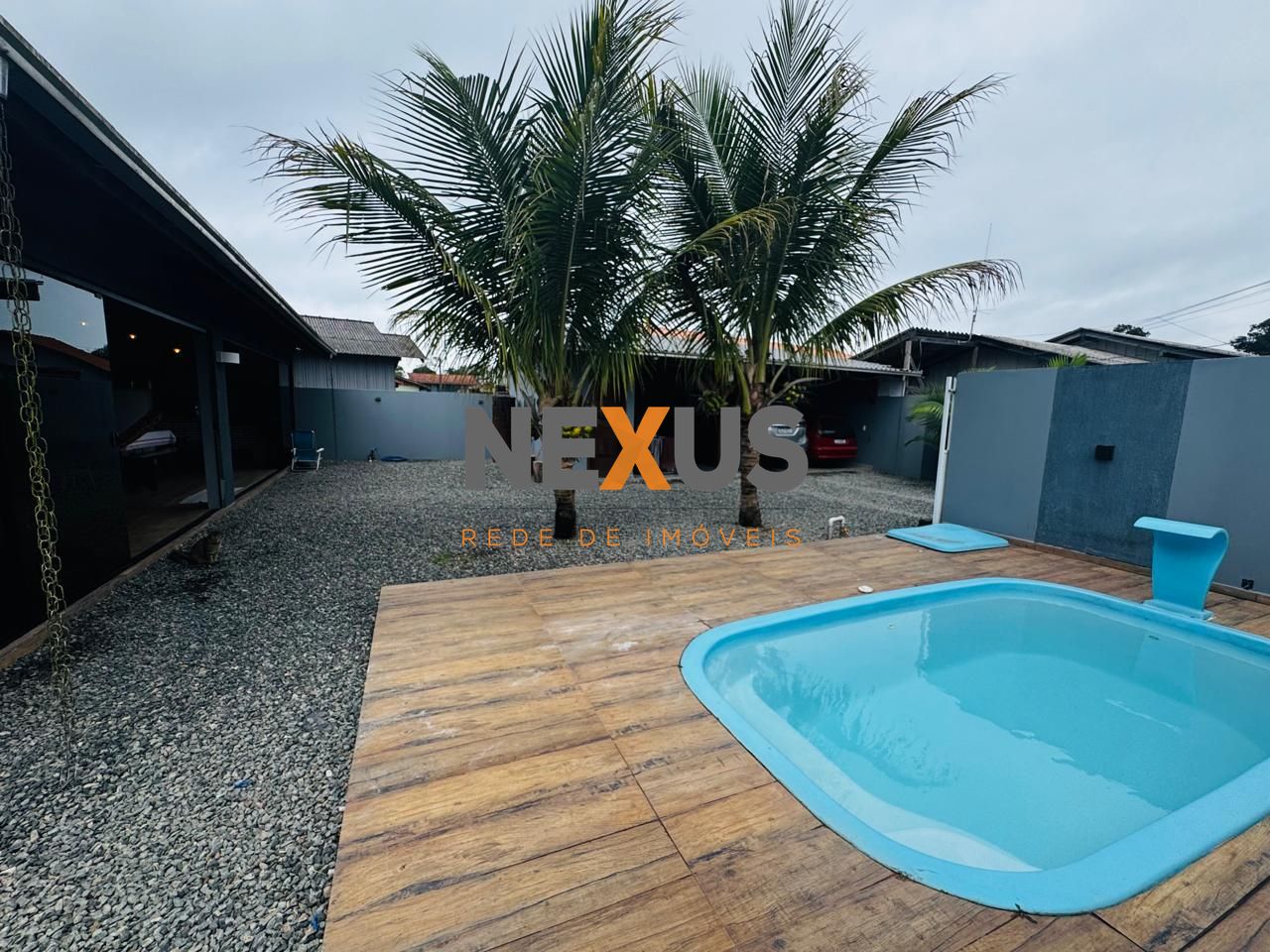 Casa com piscina aquecida à venda no Itacolomi - Piçarras SC, ...