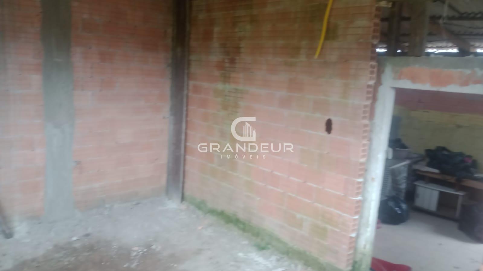 Terreno de 140m  com casa em construção no bairro Piçarras, Gu...