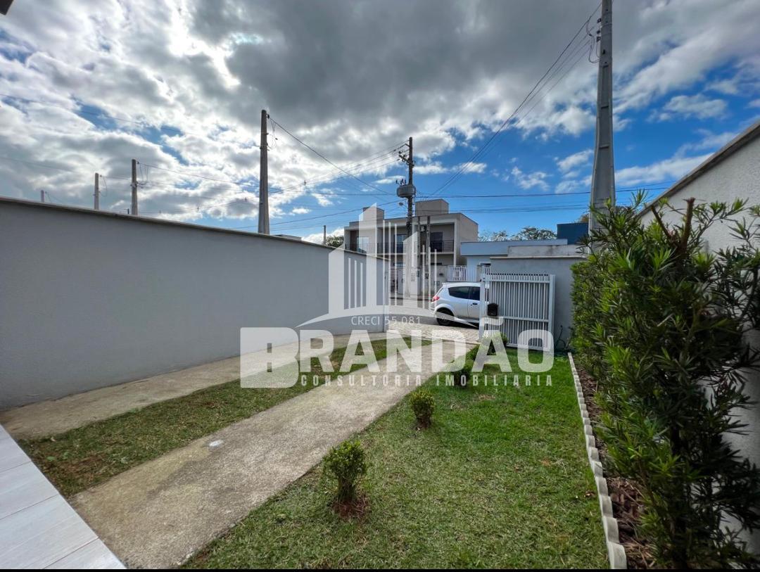 Jardim e vaga de garagem