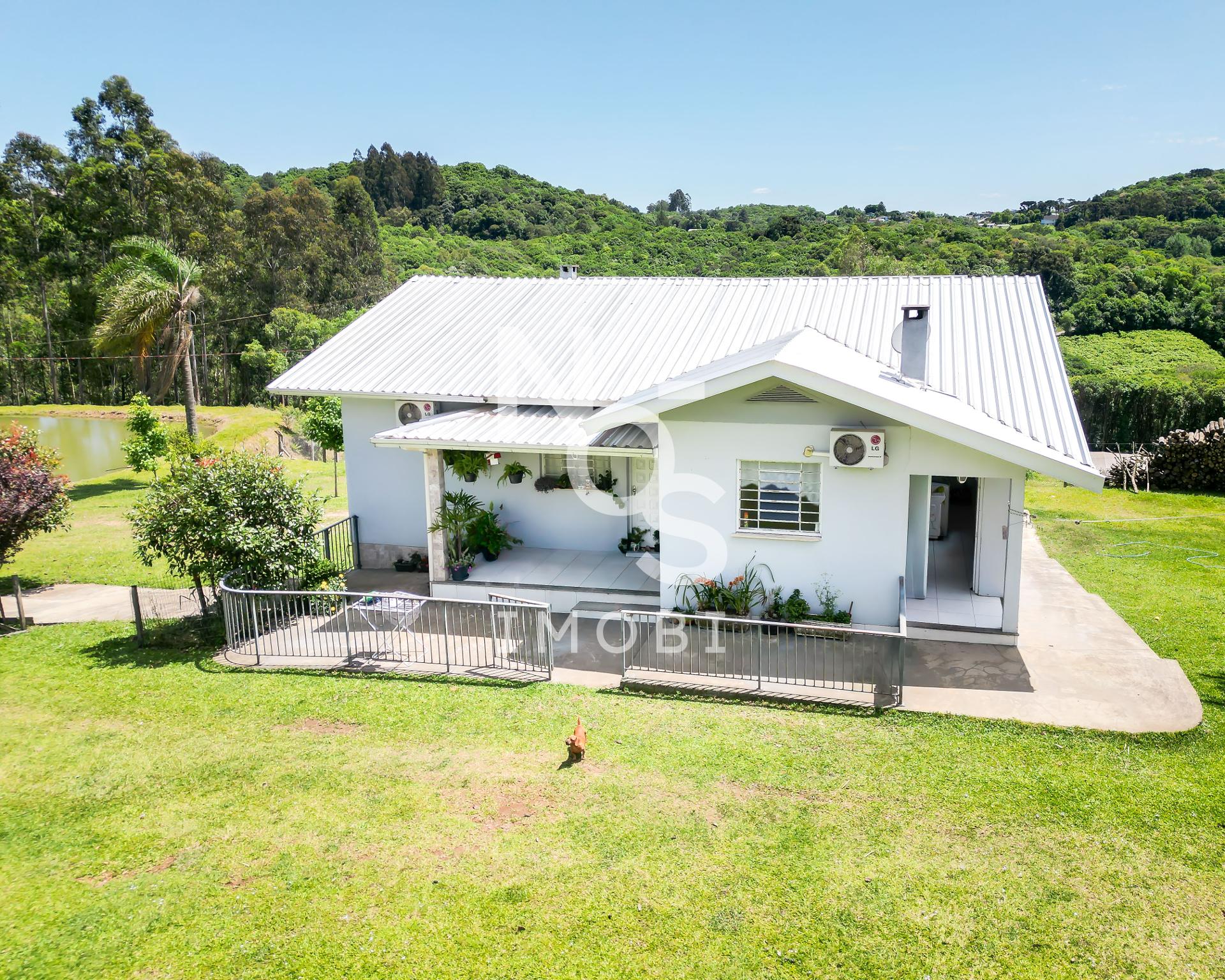 Área de Terras com Casa no Bairro Nova Roma em Flores da Cunha