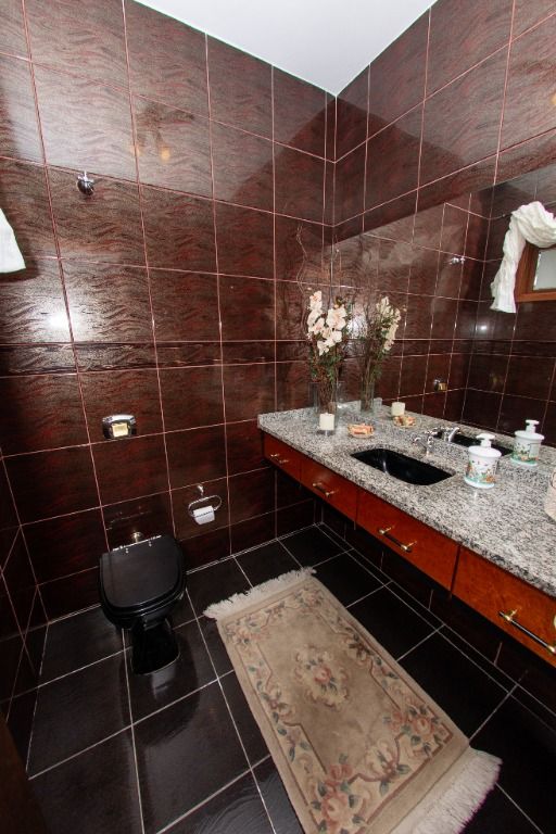 Casa com 3 suítes no Batel 