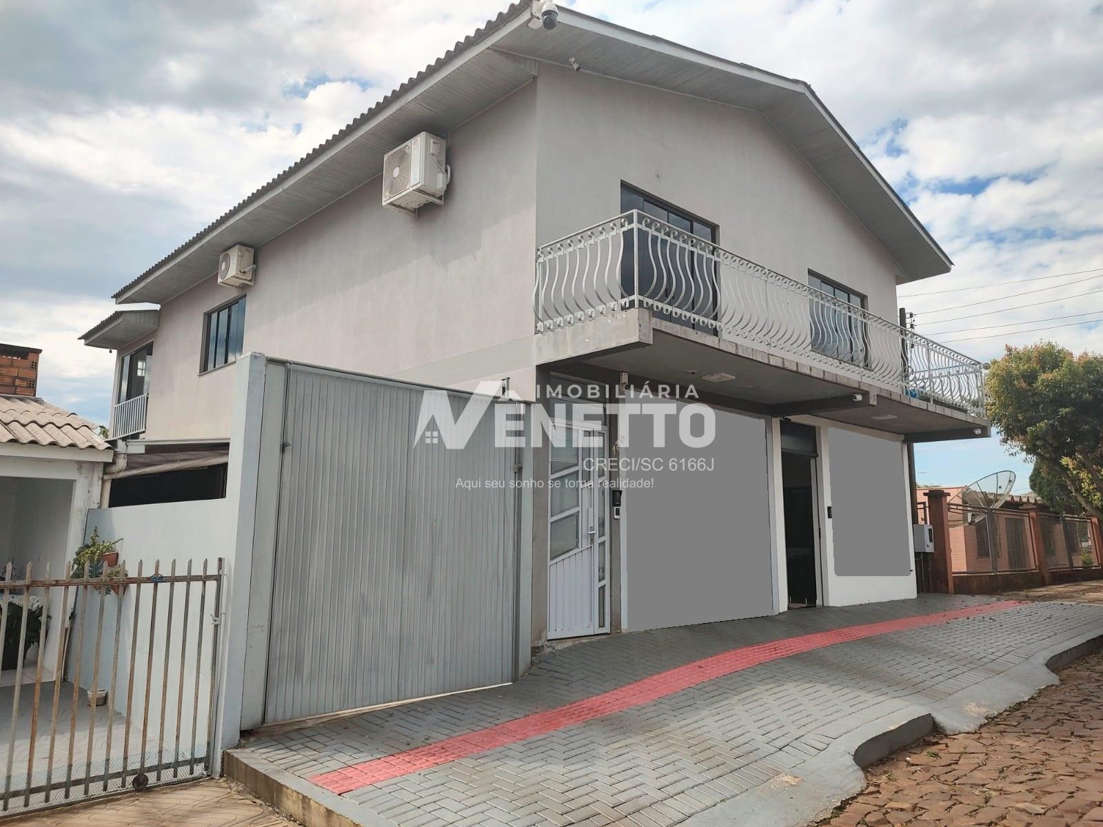 Casa com sala comercial em local de grande valorização