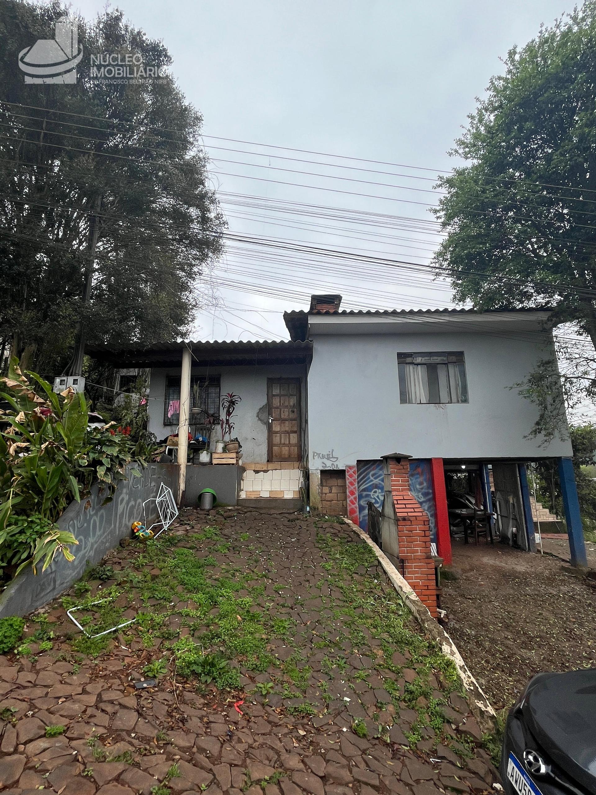 Casa com duas moradias, sendo uma com 01 quarto, sala, cozinha e lavanderia e a outra com 02 quartos